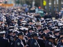 NYPD officers stand in line at the funeral of NYPD officer Jonathan Diller at St. Rose of Lima Catholic Church on March 30, 2024, in Massapequa, New York. Officer Diller was killed on March 25 when he was shot in Queens after approaching an illegally parked vehicle.
