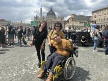 Ferrara, Italy, resident Davide Andreoli and his family visit St. Peter’s Square for the Jubilee of People with Disabilities, Monday, April 28, 2025.