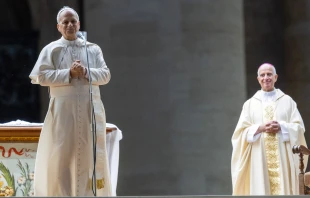 Pope Leo XIV addresses the crowd following his unexpected ride around St. Peter’s Square at the Vatican following the Jubilee of Youth welcome Mass — which was celebrated by Archbishop Rino Fisichella (right) — on July 29, 2025. Credit: Daniel Ibañez/CNA