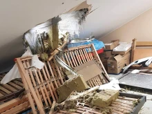 The damaged diocesan chancery in Kharkiv, northeastern Ukraine.