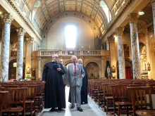 Britain’s King Charles III (right); Oratorian Father Ignatius Harrison (left); Daniel Joyce (back left), Newman archivist and librarian, Birmingham Oratory; and Father Anton Guziel (back right) walk during a tour of The Oratory of St. Philip Neri on Sept. 3, 2025.
