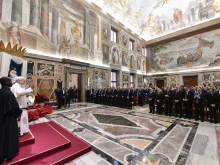 Pope Leo XIV addresses employment consultants on Dec. 18, 2025, at the Vatican.