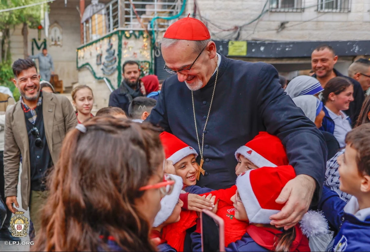 Children greet the Latin patriarch of Jerusalem, Cardinal Pierbattista Pizzaballa, during his visit to Gaza’s Holy Family Parish on Dec. 19, 2025.?w=200&h=150
