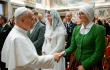 Pope Leo XIV greets pilgrims from Latvia on Nov. 24, 2025, at the Vatican.