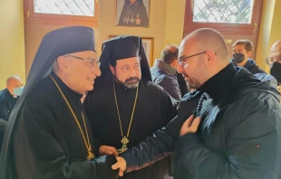 Melkite Greek Catholic Patriarch Youssef Absi of Antioch (left) and Father Chihade Abboud, rector and parish priest of the Basilica of Santa Maria in Cosmedin (center), speak with Melkite Catholic Elie Bassila. Members of the Lebanese Catholic diaspora are anticipating Pope Leo XIV’s three-day visit to Lebanon, taking place from Nov. 30 to Dec. 2, 2025. Credit: Photo courtesy of Elie Bassila