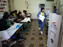 A voter casts a ballot in the parliamentary election at a polling station in the northern Lebanese city of Tripoli on May 15, 2022.