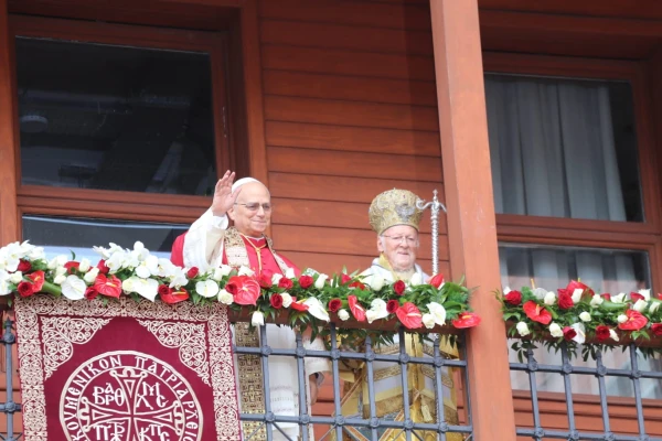Pope Leo XIV and Ecumenical Patriarch Bartholomew I give a joint blessing from the balcony of the Ecumenical Patriarchate in Istanbul, Turkey, following an Orthodox Divine Liturgy on Nov. 30, 2025. Credit: Elias Turk/EWTN News