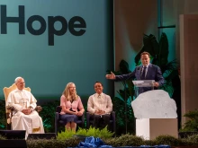 Pope Leo XIV and actor and former California governor Arnold Schwarzenegger address the opening day of the “Raising Hope for Climate Justice” conference held at a center near the papal villa of Castel Gandolfo on Oct. 1, 2025.