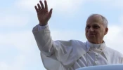 Pope Leo XIV waves to the crowd at the Vatican general audience on Oct. 25, 2025.