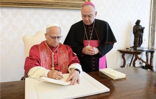 Pope Leo XIV signs his first apostolic exhortation, “Dilexi Te,” at the Vatican on Saturday, Oct. 4, 2025. Credit: Vatican Media