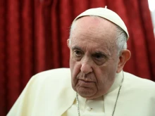 Pope Francis speaks during an in-flight press conference from Malta, April 3, 2022.