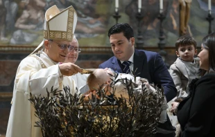 Pope Leo XIV baptizes a child in the Sistine Chapel at the Vatican on the Feast of the Baptism of the Lord, January 11, 2026. Vatican Media