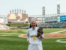 Sister Mary Jo Sobiek, OP, prepares to throw the first pitch at a Chicago White Sox game. 