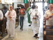 Mass at Sts. Martha, Mary and Lazarus Parish in Chicago.