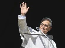 Pope Leo XIV greets pilgrims gathered in St. Peter’s Square at the Vatican for the recitation of the Angelus on Dec. 28, 2025.