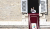 Pope Leo XIV addresses pilgrims gathered in St. Peter's Square at the Vatican for recitation of the Angelus on Jan. 1, 2026.