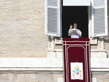 Pope Leo XIV addresses pilgrims gathered in St. Peter’s Square at the Vatican for recitation of the Angelus on Jan. 1, 2026.