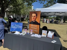 A display promotes the cause for canonization for the founder of the Knights of Columbus, Blessed Michael McGivney, on Sept. 14, 2025.