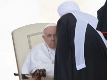 Metropolitan Anthony, chairman for external church relations of the Russian Orthodox Church, greets Pope Francis after his weekly general audience in St. Peter's Square on May 3, 2023.