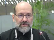 Metropolitan Job, the Eastern Orthodox bishop of Pisidia and the permanent representative of the Ecumenical Patriarchate to the World Council of Churches, speaks to delegates of the Synod on Synodality on Oct. 9, 2023, at the Vatican's Paul VI Hall. He is attending the Synod on Synodality as a fraternal delegate.