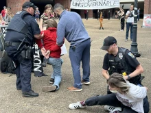 Ian Dinkla, 21, and Bryn Taylor, 26, abortion activists and students at the University of Florida are arrested by university police.