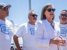 Arizona Secretary of State and Democratic candidate for governor Katie Hobbs speaks to reporters at a news conference on Aug. 2, 2022, in Tolleson, Arizona. Hobbs has made her support for abortion a centerpiece of her campaign against Republican Kari Lake.