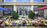 Flowers are seen on Sept. 3, 2025, outside the Annunciation Catholic Church in Minneapolis, where a shooter killed two children and injured 21 other people on Aug. 27, 2025.