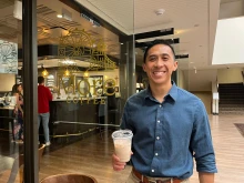 Tyler Duffy, director of evangelization at St. Thomas More Catholic Parish in Centennial, Colorado, outside More Coffee.