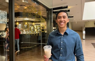 Tyler Duffy, director of evangelization at St. Thomas More Catholic Parish in Centennial, Colorado, outside More Coffee. Credit: Francesca Fenton/CNA