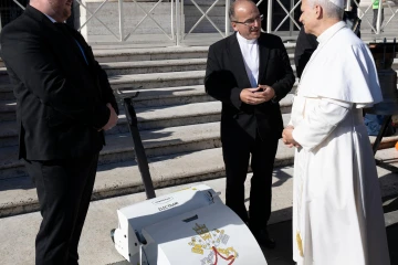 Pope Leo XIV receives an electric lawn mower from Czech manufacturer Swardman during a general audience in mid-November 2025.