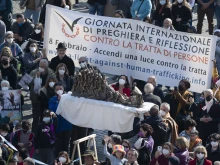 Talitha Kum members hold a sculpture of St. Josephine Bakhita in St. Peter's Square on Feb. 6, 2022.