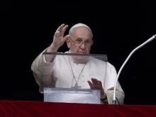 Pope Francis waves to the faithful gathered on St. Peter's Square, Dec. 26, 2022