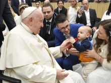 Pope Francis greets pilgrims at his Wednesday general audience on Jan. 10, 2024.