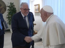 Pope Francis greets Chems-eddine Hafiz, rector of the Grand Mosque of Paris, on Feb. 10, 2025.
