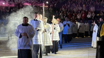 Priests process into Lucas Oil Stadium on Nov. 22, 2025, for the concluding Mass in Lucas Oil Stadium at the National Catholic Youth Conference in Indianapolis.