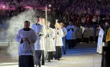 Priests process into Lucas Oil Stadium on Nov. 22, 2025, for the concluding Mass in Lucas Oil Stadium at the National Catholic Youth Conference in Indianapolis.