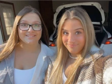 Sisters Vanessa Pagano (left) and Nichole Pagano, who are both students at Hunterdon Central Regional High School and attended an unsanctioned pro-abortion rally at the school in order to stand up for the unborn with a pro-life sign.