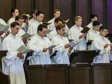 The choir sings during Candelmas at the Norbertine Fathers of St. Michael’s Abbey in Orange, Calif.