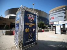 A sign for the Allstate Sugar Bowl between Georgia and Notre Dame is seen outside the Louisiana Superdome after at least 15 people were killed on Bourbon Street in a terror attack in the early morning hours of Jan. 1, 2025, in New Orleans. The game was postponed and rescheduled for Thursday, Jan. 2.