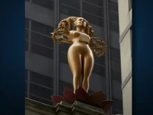 The golden-horned female statue titled “NOW” was made by Pakistani-born artist Shahzia Sikander.