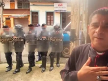 Bishop José Álvarez Lagos surrounded by police officers on Aug. 4, 2022.