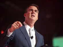 Oklahoma Gov. Kevin Stitt speaks to attendees at the 2022 Student Action Summit at the Tampa Convention Center in Tampa, Florida.