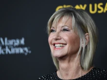 Olivia Newton-John arrives for G'Day USA Los Angeles Black Tie Gala Jan. 27, 2018, in Los Angeles. The singer and actress died Monday, Aug. 8, 2022, at age 73 after a decades-long struggle with breast cancer.