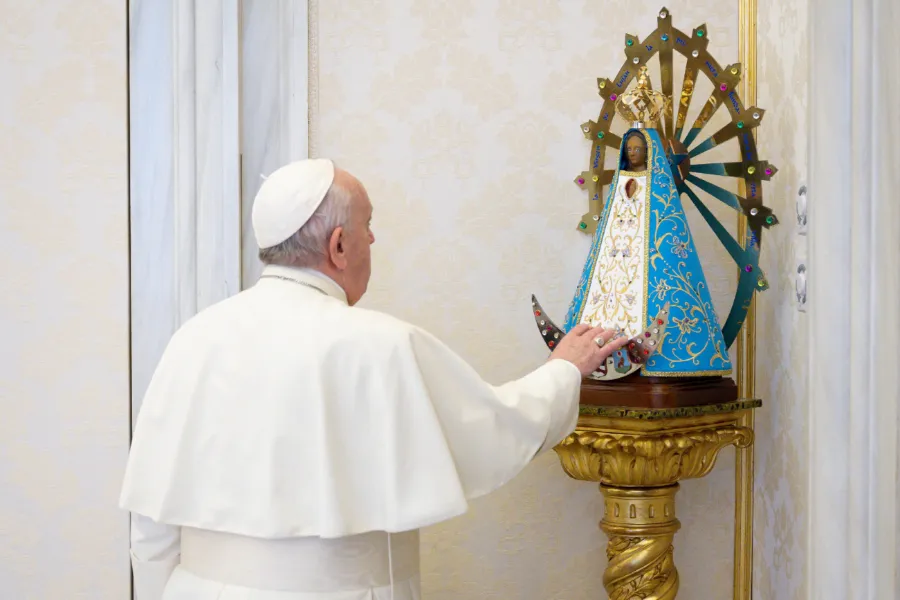 Pope Francis touches a statue of Our Lady of Luján at his general audience in the Vatican’s Apostolic Palace Dec. 2, 2020.?w=200&h=150