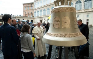 Pope Francis blesses the bell in the San Damaso courtyard at the Vatican, Sept. 23, 2020.   Vatican Media.