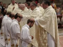 Pope Francis ordains 10 men to the priesthood. 