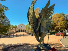 A statue of St. Michael the Archangel is one of several opportunities for outdoor veneration at the Basilica of the National Shrine of Mary, Queen of the Universe in Orlando near the major theme parks.