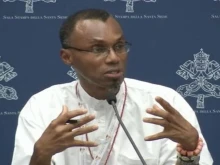 Father Agbonkhianmeghe Orobator, the dean of the Jesuit School of Theology at Santa Clara University in California, speaks at a press conference Oct. 17, 2023, at the Synod on Synodality.