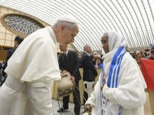 Pope Leo XIV meets with participants of the fifth World Meeting of Popular Movements on Oct. 23, 2025, in the Vatican’s Paul VI Audience Hall.