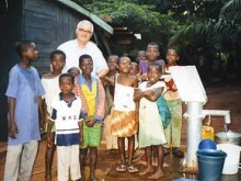 Fr. Corazzin with some of the youth he is teaching